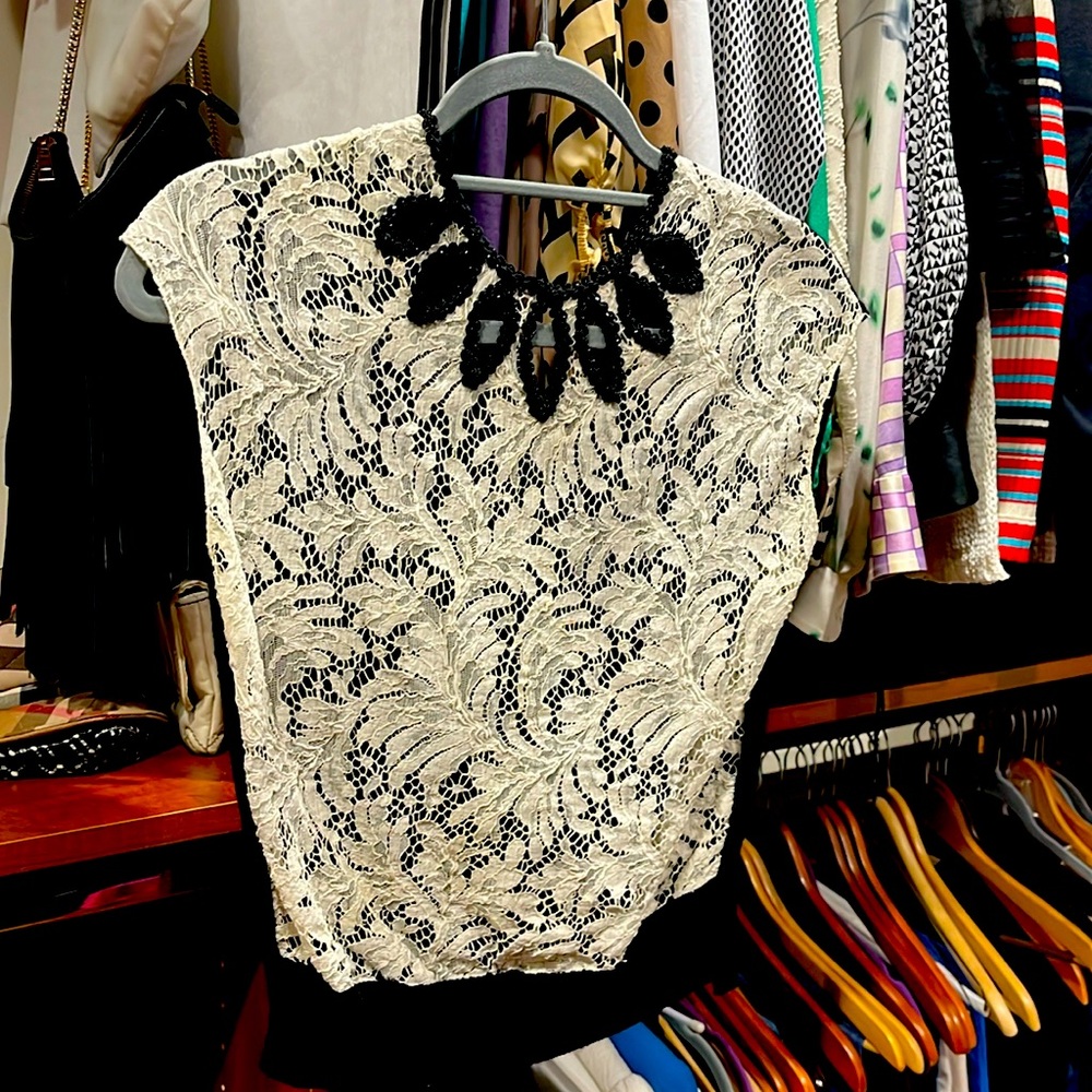 YSL crème sleeveless lace sweater top with beading detail at neckline